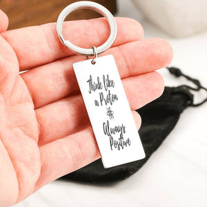 Exclusive Think Like a Proton Keychain